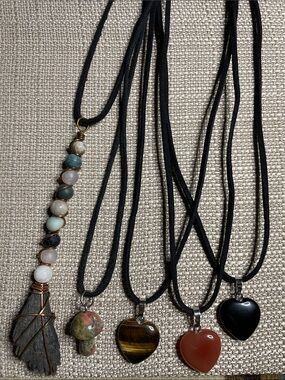 This is a lot of 5 pendants. Black Kyanite Unikite Tigers eye Carnelian Onyx
